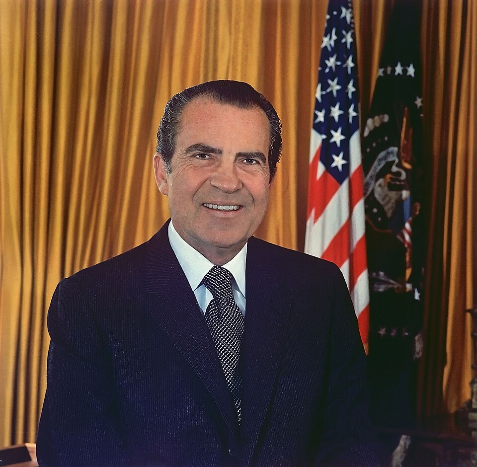 Portrait of Richard Nixon at a White House podium.