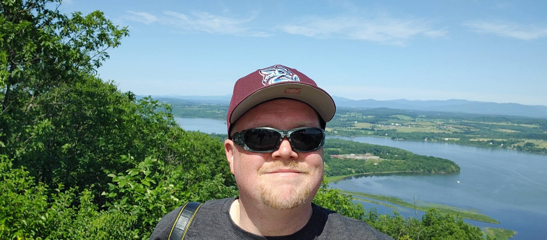 Edward A. Wilson on Mount Defiance overlooking Lake Champlain