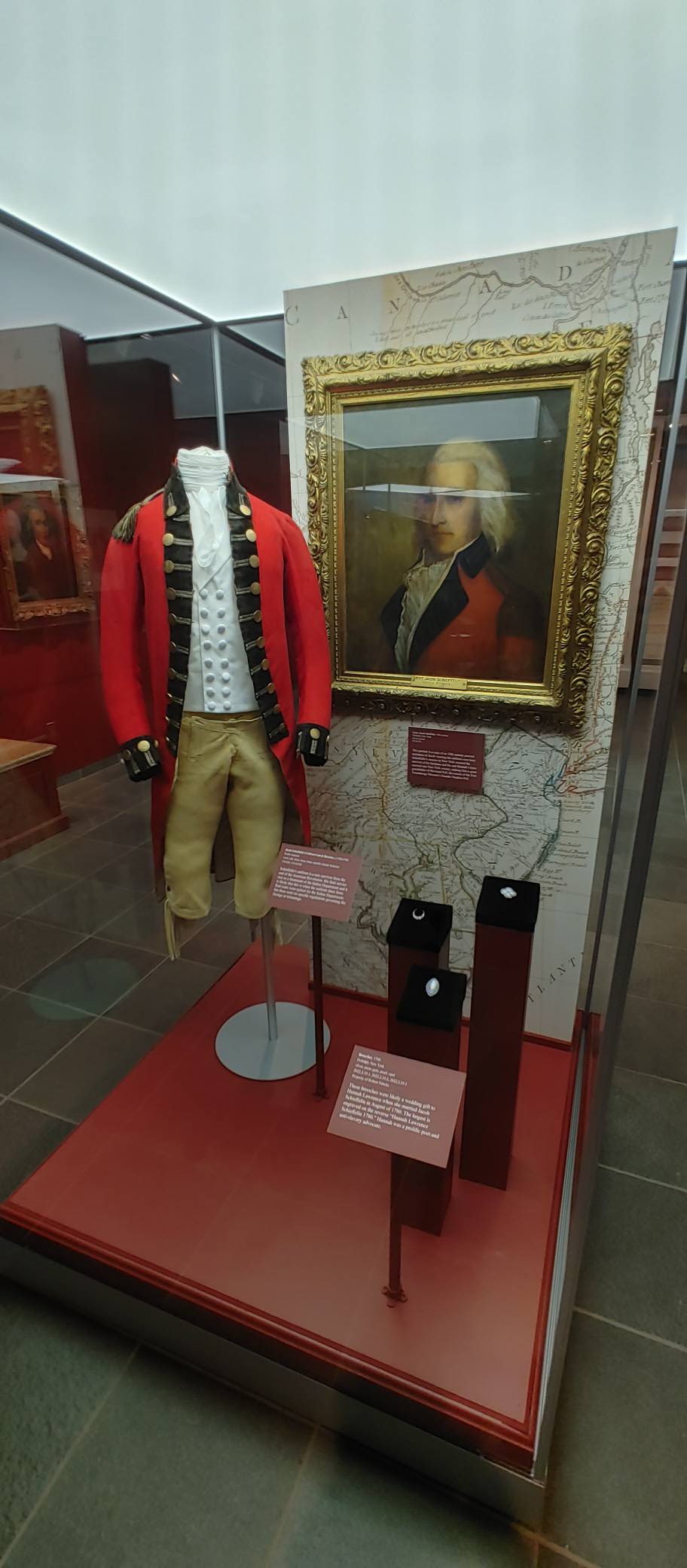 Lieutenant Jacob Schieffelin's scarlet uniform coat and portrait displayed at Fort Ticonderoga