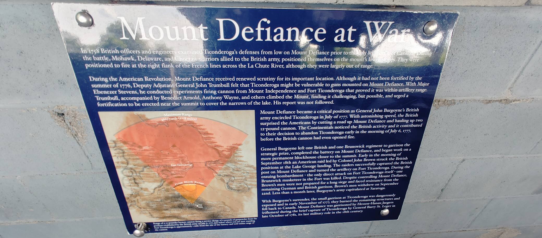 Interpretive sign explaining the military history of Mount Defiance